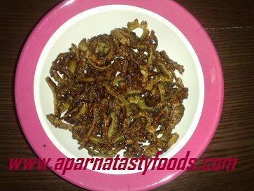 Bitter gourd fry /Pavakka mezhukkuvaratti
